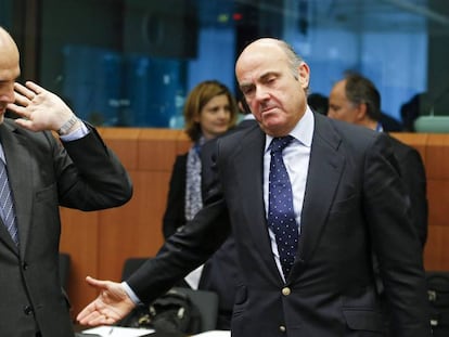 EU Commissioner for Economic Affairs Pierre Moscovici with Spanish Economy Minister Luis de Guindos.