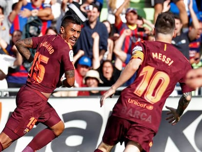 Paulinho i Messi celebren el gol de la victòria del Barça davant el Getafe.