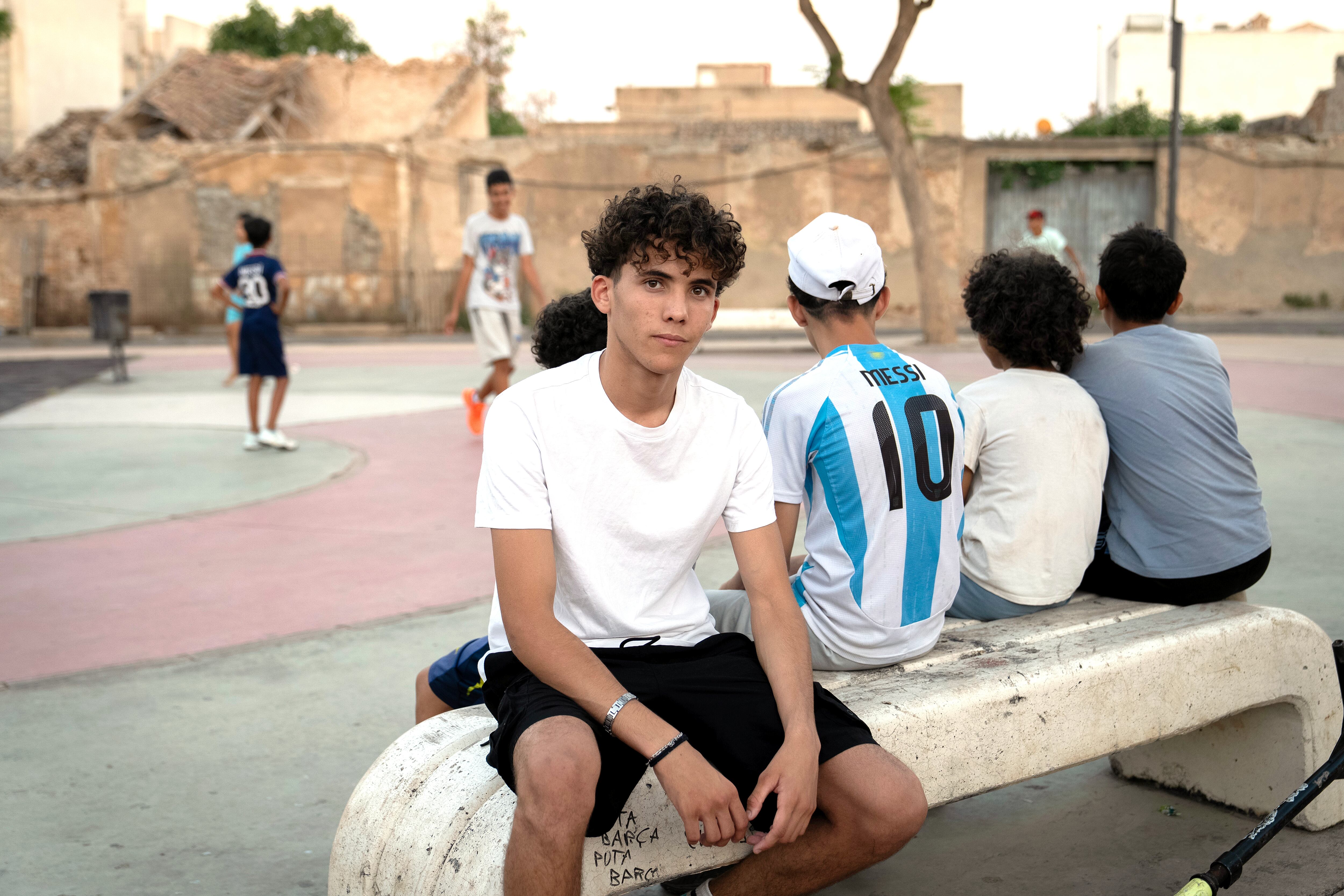 Ismael Nasri, in a town square.