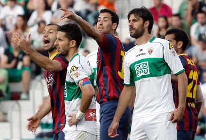 Busquets y Mascherano , junto a Coro y Pelegrín