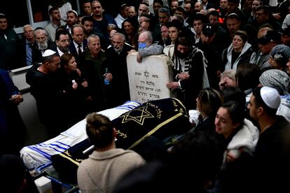 Mourners gather during the funeral of Eli Mizrahi and his wife, Natalie, who were victims of a shooting attack in east Jerusalem on January 27, 2023, in Bet Shemesh, Israel, on January 28, 2023.