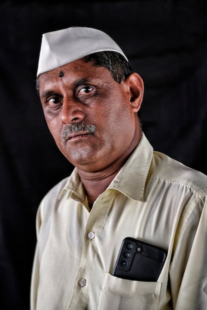 Hirman Dabhade, 55, is from Rachguru Nagar (Pune) and has been working as a 'dabbawala' for 35 years.