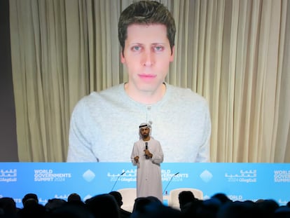 Minister of State for Artificial Intelligence, Digital Economy and Remote Work Applications of UAE Omar Al Olama (front), speaks as Chief Executive Officer of OpenAI Sam Altman is seen on a screen as they attend a session at the World Government Summit in Dubai, United Arab Emirates, 13 February 2024.