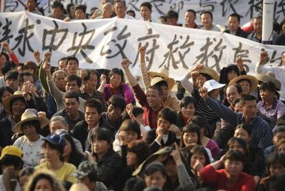 Los habitantes de Wukan (sur de China) protestan por la expropiación ilegal de tierras.