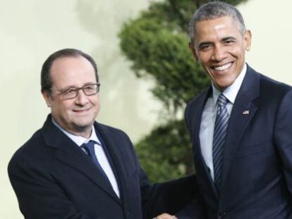 El president francès, François Hollande, rep el president dels EUA, Barack Obama, a la cimera de París el 30 de novembre.