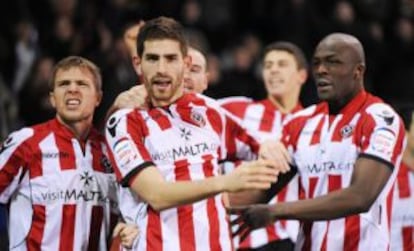 Evans celebra un gol, en un partido con el Sheffield United.