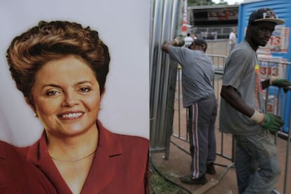 Unos operarios colocan un cartel de Dilma Rousseff en un acto de campa&ntilde;a