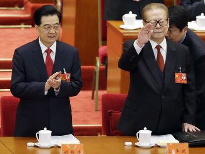 El presidente chino Hu Jintao y el expresidente Jiang Zemin.
