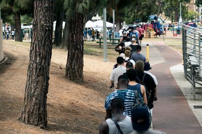 hundred people wait in line to get a monkeypox vaccine