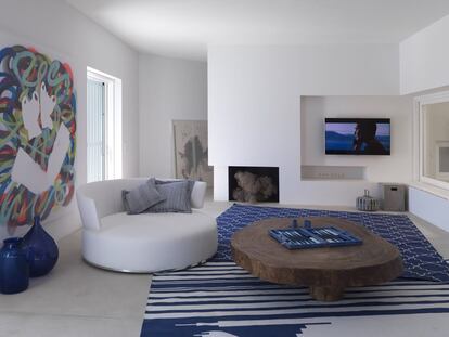 En el salón, el sofá con forma circular es el modelo Swivel diseñado por Antonio Citterio y producido por Maxalto. La mesa de madera maciza es de la empresa Cosset Design, de Miconos, y la alfombra en tonos azules, de la firma india Shyam Ahuja.