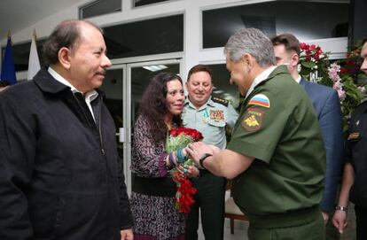 President Daniel Ortega, left, and his wife Rosario Murillo greet Russian Defense Minister Sergei Shoigu.