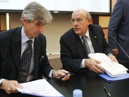 El director del AQuAS, Josep Maria Argimon y el ex consejero de Salud, Boi Ruiz