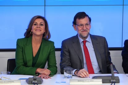 PP secretary general Maria Dolores de Cospedal and Prime Minister Mariano Rajoy.