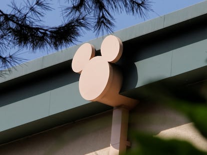 A rain spout stylized with the outline of Disney character Mickey Mouse is seen on a building at The Walt Disney Co studios in Burbank, California August 9, 2011.