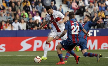 Enric Gallego, ante Luna y Rochina, del Levante.