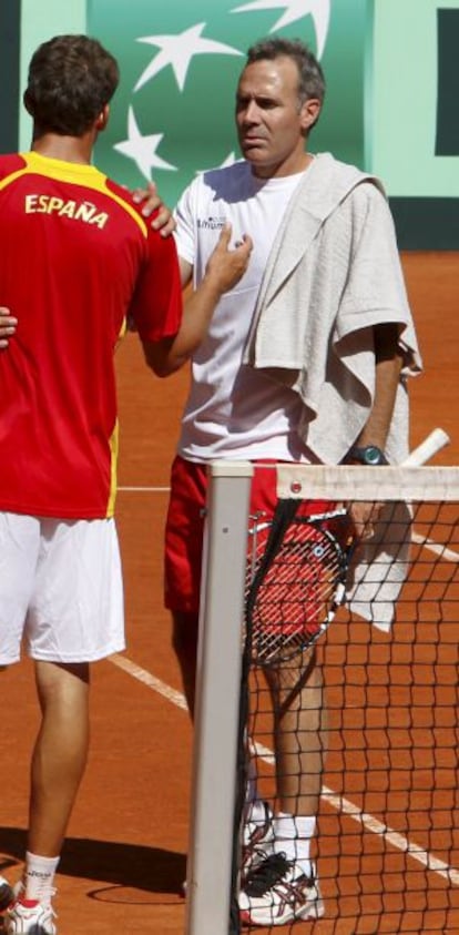 Spain player Fernando Verdasco and &Agrave;lex Corretja during a training session.