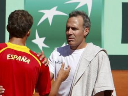 Spain player Fernando Verdasco and &Agrave;lex Corretja during a training session.