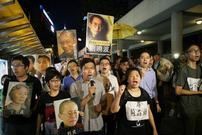 Protesta contra la visita del presidente chino Xi Jinping a Hong Kong y en apoyo del disidente Liu Xiaobo.
