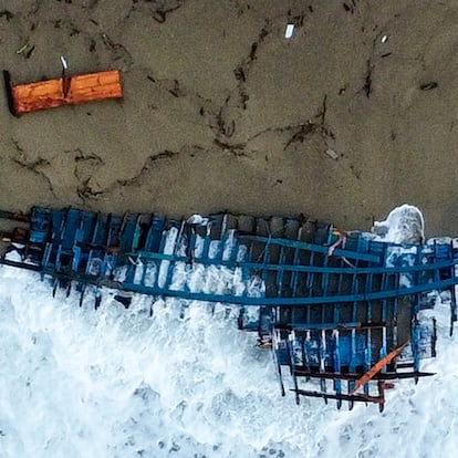 A view of part of the wreckage of a capsized boat that was washed ashore at a beach near Cutro, southern Italy, Monday, Feb. 27, 2023. Rescue crews searched by sea and air Monday for the dozens of people believed still missing from a shipwreck off Italy’s southern coast that drove home once again the desperate and dangerous crossings of migrants seeking to reach Europe. (AP Photo/Luigi Navarra)