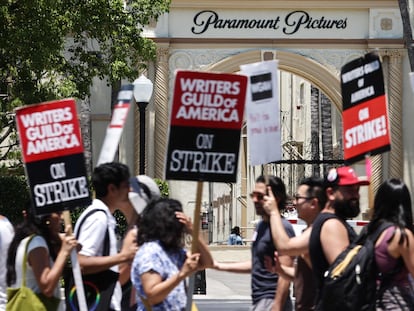 Striking WGA (Writers Guild of America) workers picket outside Paramount Studios on July 12, 2023, in Los Angeles, California.