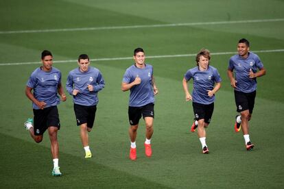 Los jugadores del Real Madrid entrenando.