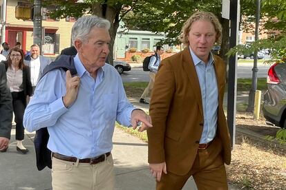 Federal Reserve Chair Jerome Powell, left, and Kevin Schreiber, CEO of the York County Economic Alliance, walk in York, Pa. on Monday, Oct. 2, 2023