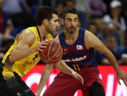 Navarro ante Bassa, en el &uacute;ltimo duelo ante Tenerife en el Palau. 