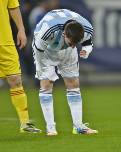 Messi vomits during Argentina's friendly against Romania on Wednesday.