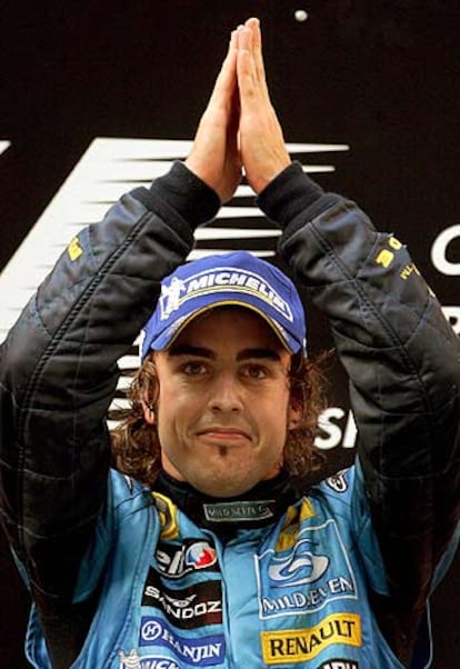 Alonso, en el podio tras ganar el Gran Premio de China, el último del pasado Mundial.