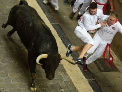 An Australian citizen is tossed in the air by the fearsome Jandilla bulls, which killed a runner in 2009