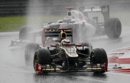 Kimi Raikkonen y el japones Kamui Kobayashi