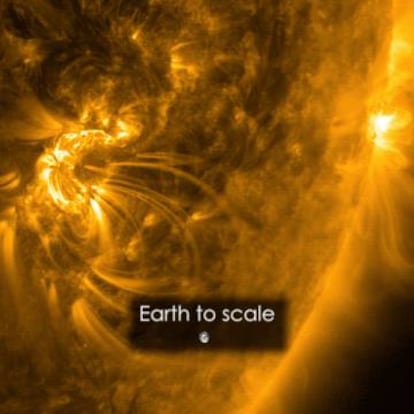 Imagen del tamaño de la llamarada solar, comparada con la Tierra.