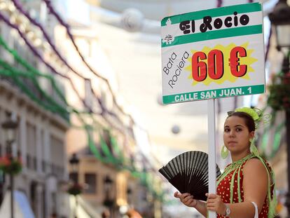 Ambiente en la calle Larios, en el arranque la feria de agosto