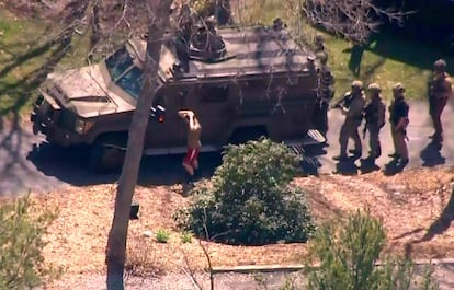 This aerial footage courtesy of WBZ via CBS shows the suspect national guardsman Jack Teixeira taking into custody by FBI agents in a forested area in North Dighton, in Massachusetts.