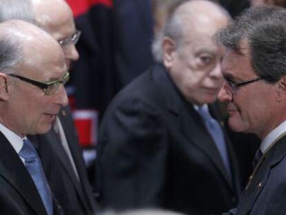 Montoro y Mas, durante la toma de posesión de este último como presidente de la Generalitat, el pasado diciembre.