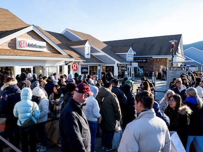 Consumers lining up at a Lululemon store in New York state for Black Friday deals, on November 24, 2023.