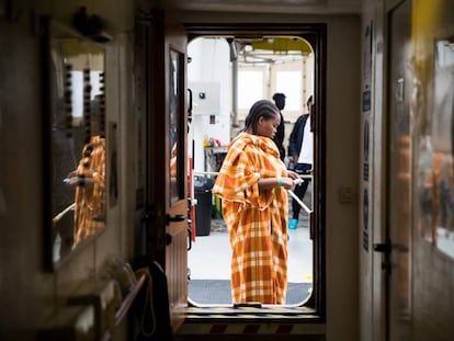 A migrant receives a toothbrush on the ‘Aquarius.’