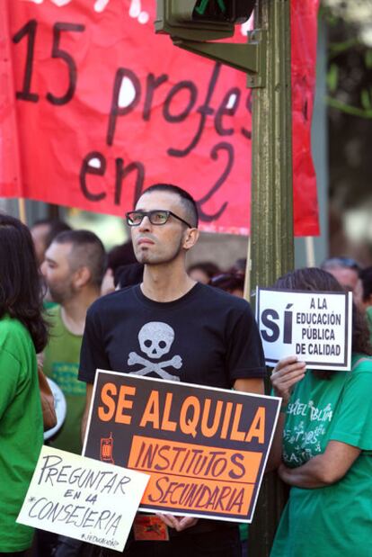Protestors outside the Fernando el Católico school in Madrid on Tuesday.