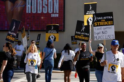 SAG-AFTRA members and supporters picket outside Warner Brothers Studios on day 99 of their strike in Burbank, California, October 20, 2023.