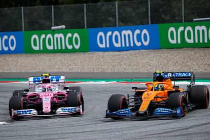 Lance Stroll (izquierda), de Racing Point, trata de adelantar a Lando Norris, de McLaren Renault, este domingo en el Gran Premio de Estiria de F1.