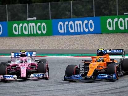 Lance Stroll (izquierda), de Racing Point, trata de adelantar a Lando Norris, de McLaren Renault, este domingo en el Gran Premio de Estiria de F1.