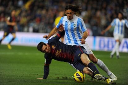 Messi con su compatriota Martín Demichelis.