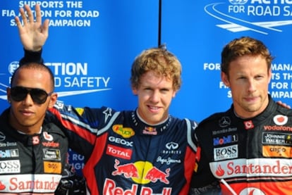 Sebastian Vettel celebra la pole conseguida en el GP de Italia junto a Hamilton (2º) y Button (3º).