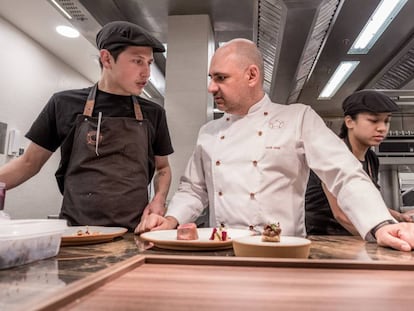 Jordi Artall (r), the head of Cinc Sentits, a family-run Barcelona establishment that was awarded the Green Star.