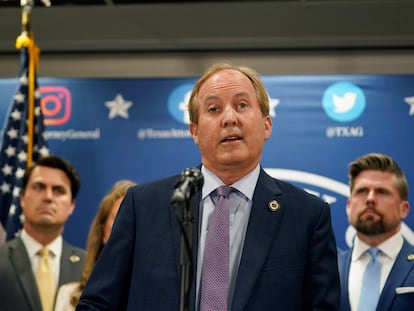Texas state Attorney General Ken Paxton reads a statement at his office in Austin, Texas, Friday, May 26, 2023.