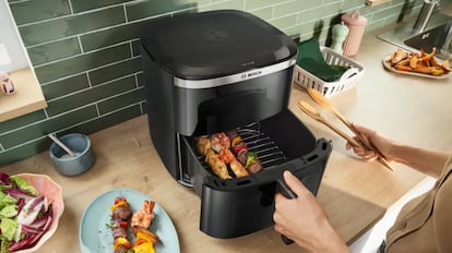 freidora sin aceite bosch con un peso inferior a 6 kilogramos.