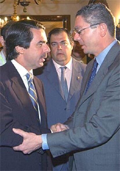 José María Aznar y Alberto Ruiz-Gallardón, ayer en El Escorial.