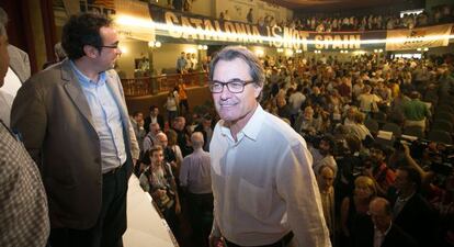 Artur Mas i Josep Rull, coordinador del partit, en l'acte de dissabte a Molins de Rei.