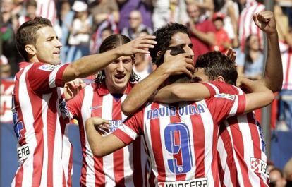 Los jugadores del Atlético celebran un gol.