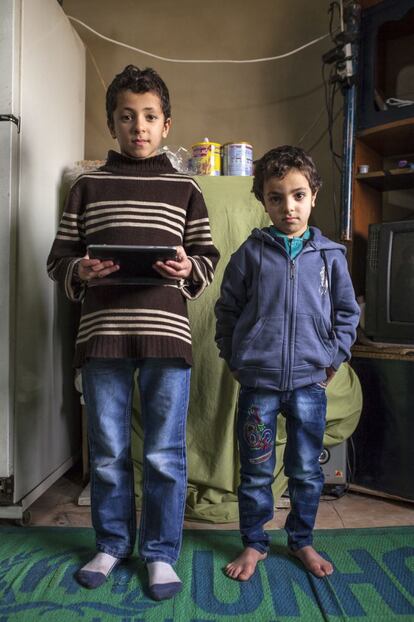 It’s dark when Abdel Rahman, 9 (pictured left with his younger brother Abdul) rises at 4.30 am to prepare himself for school. First he makes sure his notebook, treasured blue pen and completed homework are in his small nylon string backpack. Then the young Syrian from Daraa checks his one pair of jeans and thinning school jumper are clean, washes his face and combs his hair before carefully unraveling a piece of flat bread for his breakfast. This is done in silence – the room he wakes in at the Danish Refugee Council’s Marj Collection Center in Bekaa Valley, Lebanon, is home for his six younger brothers and parents. “I like to learn. It makes me feel free,” Andulla says. “I want to become a doctor so I can heal the people in Syria and help take care of my brothers and parents.” As for Abdullah’s father, Ayham, he could not be more proud of his young son’s dedication to learning. “We had to leave everything behind in Syria and came to Lebanon with nothing. The children have been through too much but I encourage them to learn. I never had an education. With education you are promoting independence. If he gets an education he may get a chance.” #WithSyria #Notnumbers.People.  Photograph: Eduardo Soteras Jalil